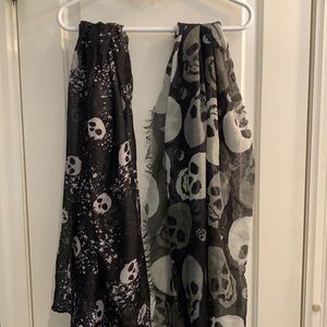 Two black skull print scarves